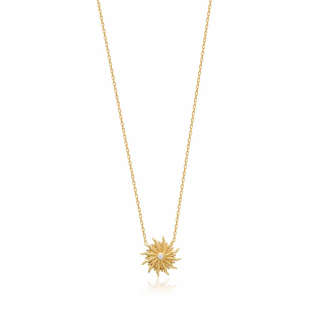 Add a touch of radiance to your outfit with our Sun Necklace. Made with 14ct gold plated sterling silver and a sparkling zirconia stone