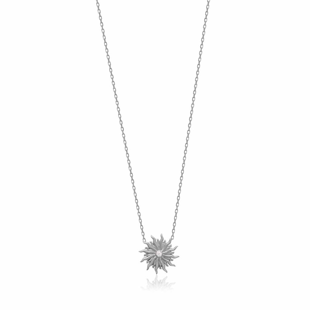 Add a touch of radiance to your outfit with our Sun Necklace. Made with sterling silver and a sparkling zirconia stone